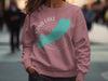 Rose sweatshirt with Sand Lake Ontario map graphic and compass design.