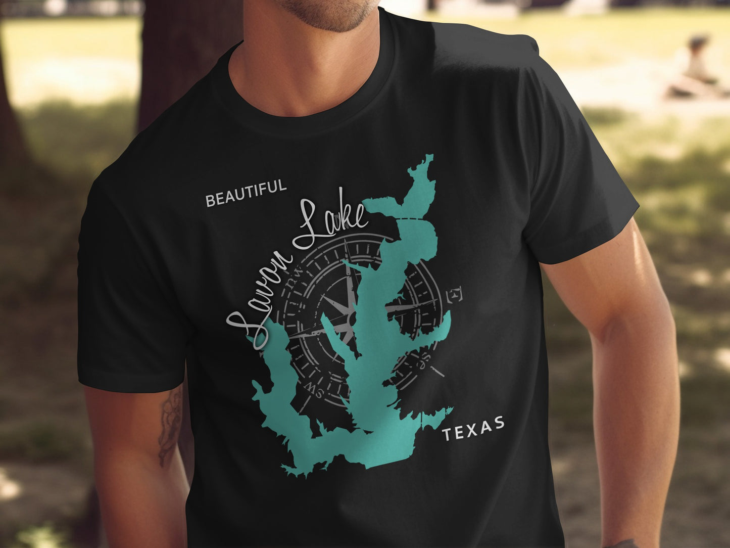 Black t-shirt with "Savon Lake" map and compass graphic, "TEXAS" below.