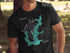 Black t-shirt with "Savon Lake" map and compass graphic, "TEXAS" below.