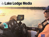 Man in boat with fishing electronics; "Lake Lodge Media" text overlay.