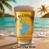 Beer glass with "Lake Buchanan" text, map of Texas, and beach scene.