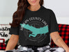 Black t-shirt with Harlan County Lake map and compass graphic. Nebraska.