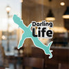 Turquoise outline of a dragon with "Darling Life" logo, © Lake Lodge Media LLC.