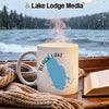 White mug with "Black Lake New York" design and steaming hot beverage.