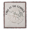 Woven blanket with compass design and "Lake of the Ozarks Missouri" text.