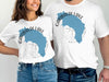 White t-shirts featuring Garibaldi Lake map outline and compass with text.