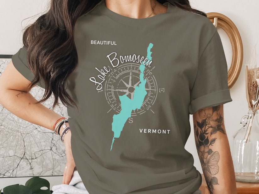 Olive t-shirt with teal Lake Bomoseen Vermont map and compass graphic.