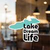 Teal lake-shaped sticker with black text reading "Lake Dream Life".