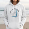 White hoodie with "Lake Vermillion Minnesota" and a compass rose design.