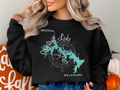 Black sweatshirt with "Beautiful Shatook Lake Oklahoma" and compass graphic.