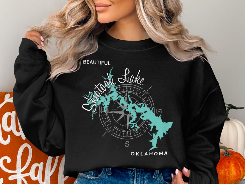 Black sweatshirt with "Beautiful Shatook Lake Oklahoma" and compass graphic.