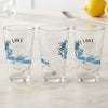 Three clear pint glasses with "Rainy Lake Minnesota" and compass design.