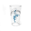 A clear glass pint glass printed with a blue map of Minong Flowage, Wisconsin, and a compass rose.