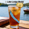 Iced tea in a glass with a compass design and "Scisco Lake" text.