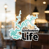 Wedowee Life sticker on a window with a teal lake outline and black text.