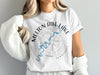 White t-shirt with Melton Hill Lake Tennessee map and compass graphic.