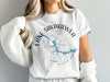 White t-shirt with Lake Sakakawea North Dakota map and compass design.