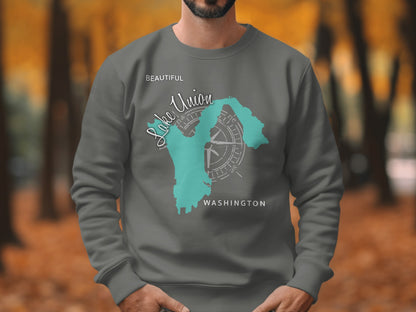 Gray sweatshirt with a teal map of Washington and compass graphic.