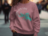 Rose crewneck sweatshirt with "Canyon Lake Texas" and compass design.