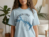 Blue t-shirt featuring Skiatook Lake Oklahoma map outline and compass rose design.