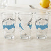 Three clear glasses featuring Rangeley Lake map and compass design.