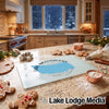 A glass cutting board featuring a blue map of Lake McConaughy rests on a kitchen counter with gingerbread cookies and baking supplies.
