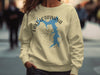 Cream sweatshirt with blue Lake Lotawana Missouri map graphic and compass design.