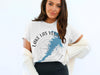 White t-shirt with "Lake Las Vegas Nevada" text and a compass rose design.