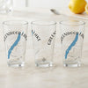 Three clear glasses with a compass rose, blue lake map, and "Greenwood Lake New Jersey" text.