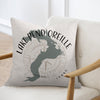 Light beige pillow with Lake Pend Oreille map and compass design and text.