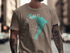 Taupe t-shirt with turquoise Lake Waco map and compass, "Lake Waco Texas" text.
