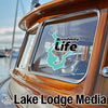 Lake Lodge Media sticker with "Broadway Life" text and a teal lake outline on a boat window.