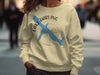 Light yellow sweatshirt with a blue shark outline and "Lake Darling Iowa" text.