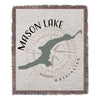 Woven blanket with Mason Lake Washington map and compass design.