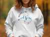 White hoodie with "Weiss Lake Alabama" text and compass graphic.