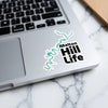 Sticker with teal Melton Hill map graphic and "Melton Hill Life" text.
