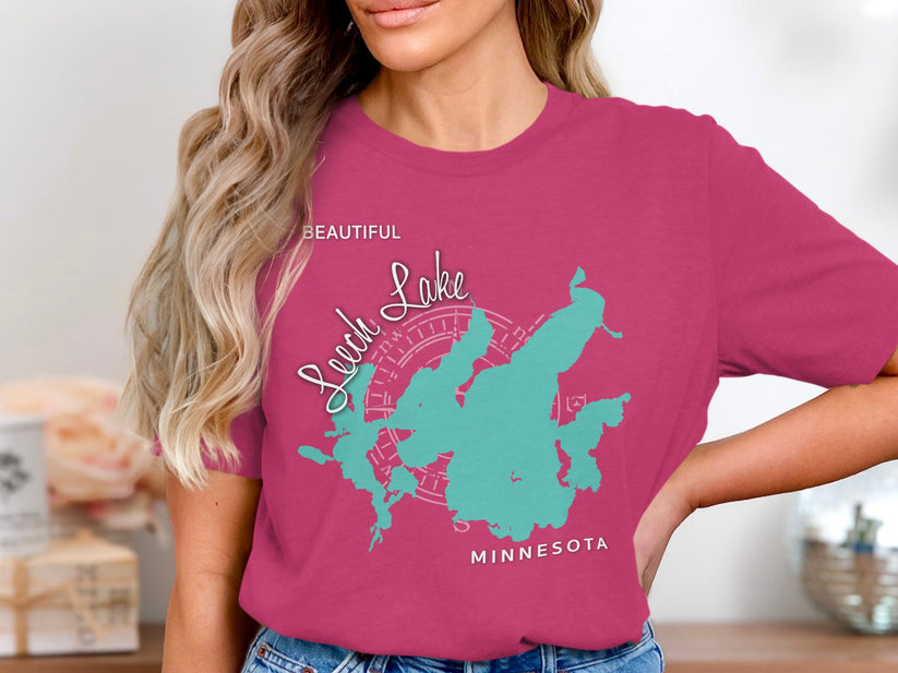 Pink t-shirt with "Leech Lake" map and compass graphic.