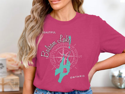 Compass rose and map of Balsam Lake, Ontario on a pink t-shirt.