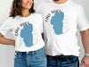 Two people in white t-shirts with "Lake Tahoe" and a blue map of the lake.