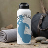 White insulated water bottle with blue map and "OHIOPEKA" text on a rock surface.