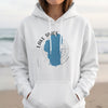 White hoodie with a blue Lake Tahoe outline and compass graphic.
