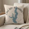 Pillow with Lake Ray Hubbard map and Texas text, on a sofa.