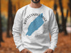 White sweatshirt with Rattlesnake Lake Washington map and compass design.