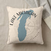 Light beige pillow with blue Lake Michigan map and compass rose.