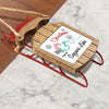 Wooden Christmas ornament shaped like a sled with a map of Saguaro Lake.