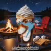 Dessert with whipped cream, s'mores ingredients, campfire, and lake at night.