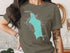 Olive t-shirt with a teal map outline of Jordan Pond, Maine.