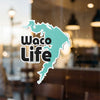 Turquoise map outline sticker with text that reads "Waco Life."