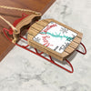 Wooden sleigh ornament with red runners, "Merry Christmas Toledo Bend" text, and lake outline.