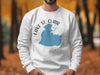 White sweatshirt with blue Lake St. Clair and Michigan graphic.